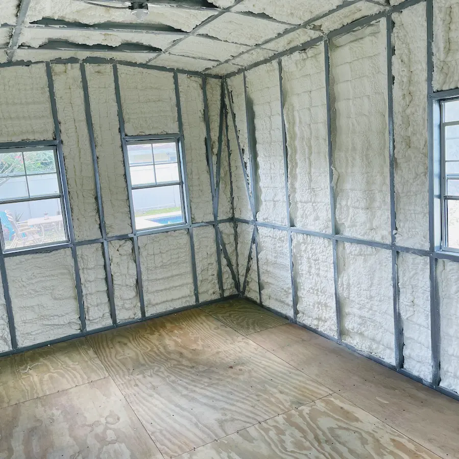 Closed-cell spray foam insulation applied to wall cavities in a residential project in Scotch Plains